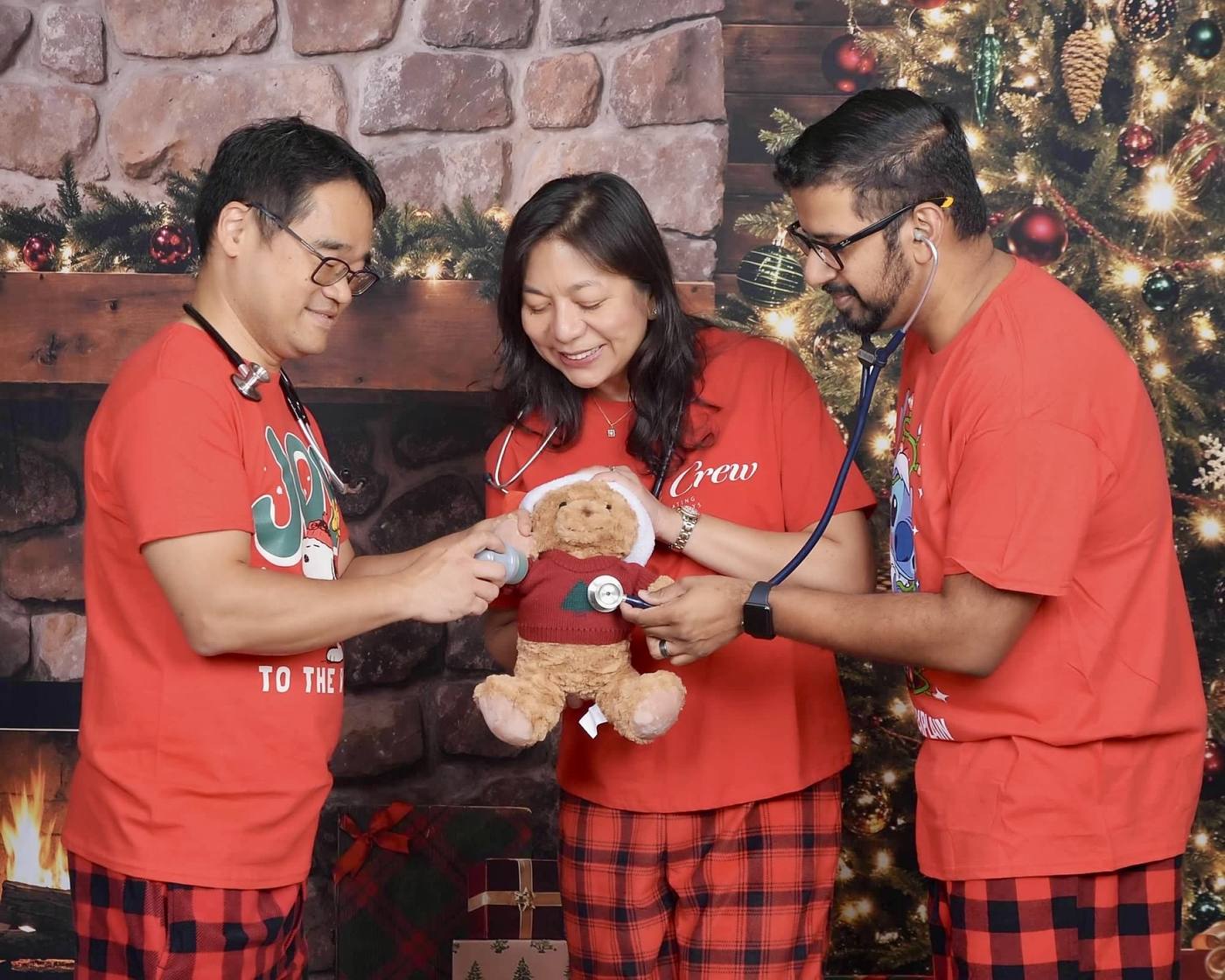 Doctors checking in on their favorite holiday patient